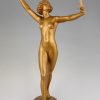 Art Deco gilt bronze sculpture of a nude with two swords.