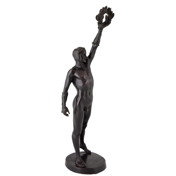 The Victorious Boxer, antique bronze sculpture male nude boxer with laurel wreath.