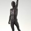 Le vainqueur, sculpture en bronze boxeur nu avec couronne de laurier