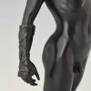 Le vainqueur, sculpture en bronze boxeur nu avec couronne de laurier