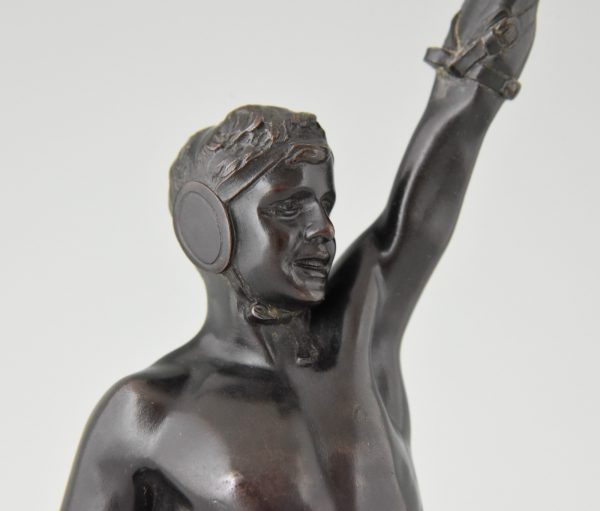 The Victorious Boxer, antique bronze sculpture male nude boxer with laurel wreath.