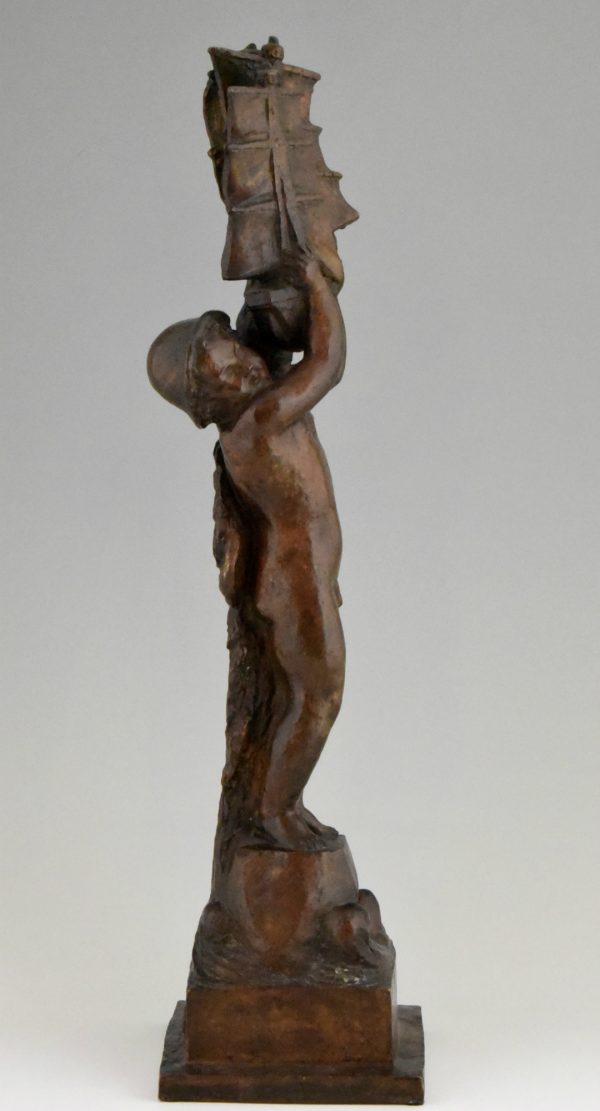 Art Deco bronze sculpture nude boy with boat.