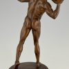 Antique bronze sculpture male nude throwing stone