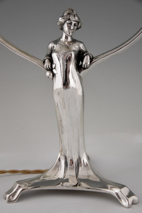 Pair of silvered Art Nouveau lamps with ladies