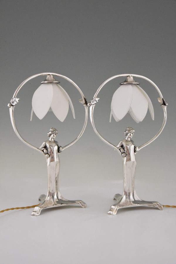 Pair of silvered Art Nouveau lamps with ladies