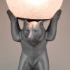 Art Deco bear lamp with crackle glass globe