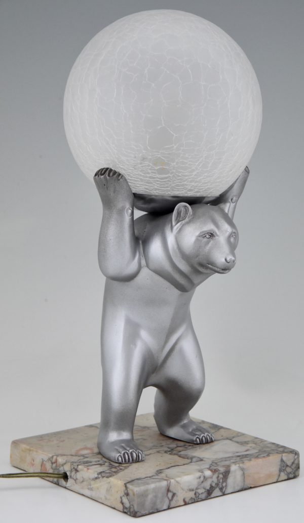 Art Deco bear lamp with crackle glass globe