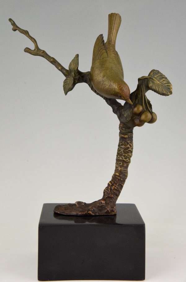 Art Deco bronze sculpture bird on a branch with berries