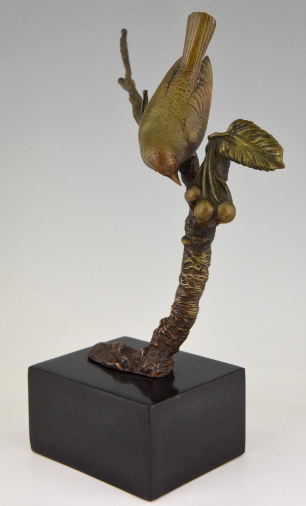 Art Deco bronze sculpture bird on a branch with berries