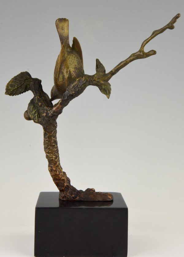 Art Deco bronze sculpture bird on a branch with berries