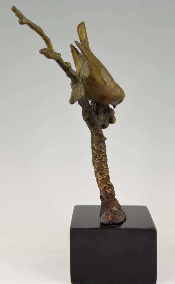 Art Deco bronze sculpture bird on a branch with berries