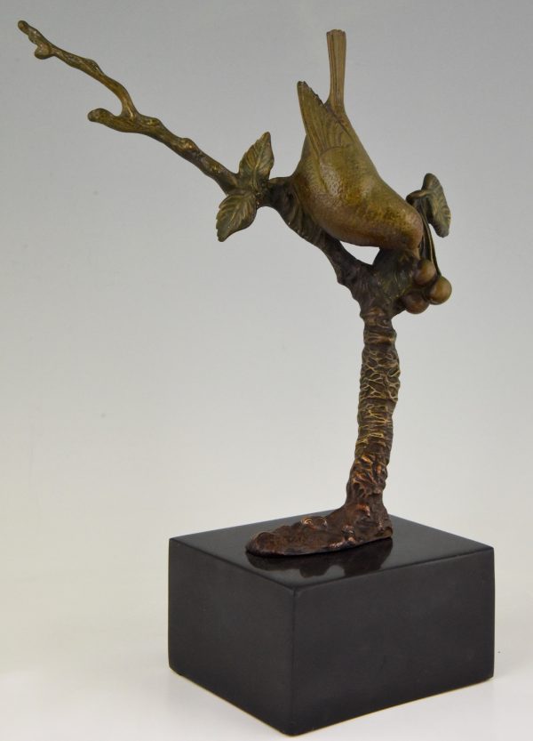 Art Deco bronze sculpture bird on a branch with berries