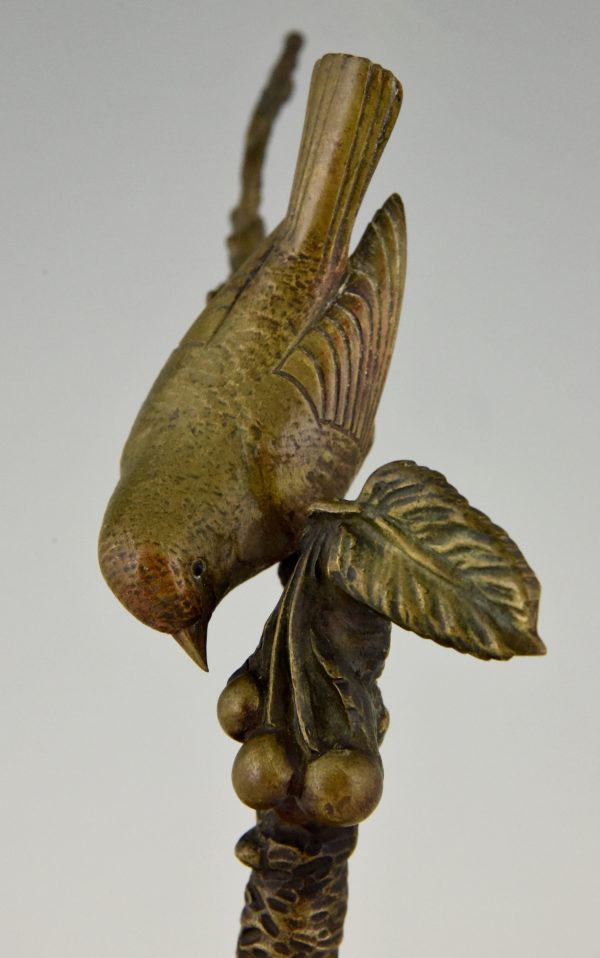 Art Deco bronze sculpture bird on a branch with berries