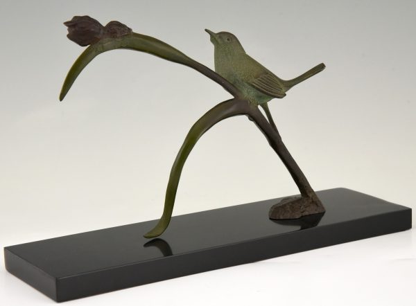 Art Deco bronze sculpture bird on an iris