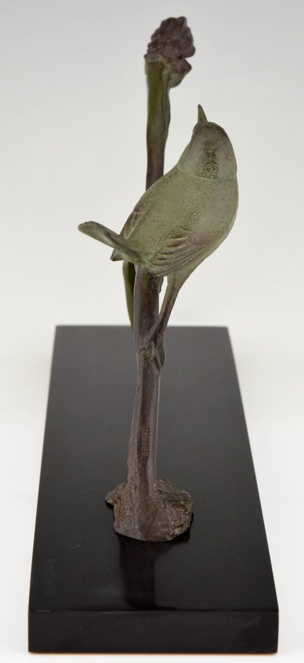 Art Deco bronze sculpture bird on an iris