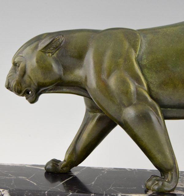 Art Deco sculpture of a walking panther