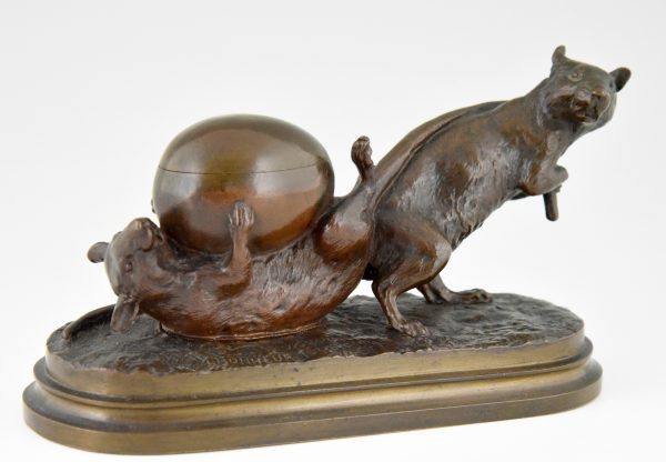 Antique bronze of two mice with egg