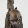 Antique bronze of two mice with egg