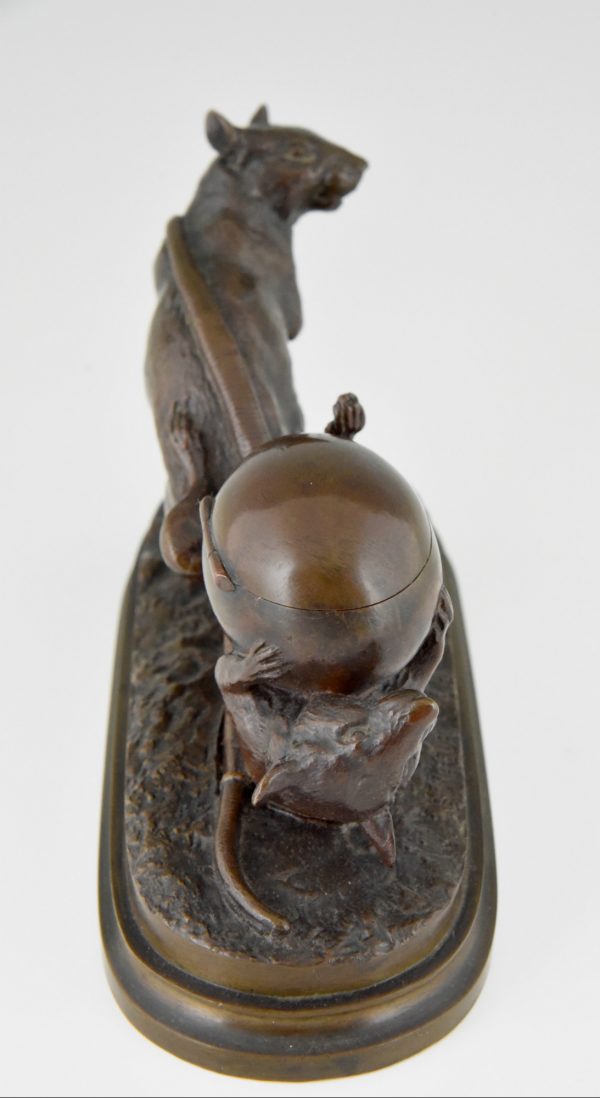 Antique bronze of two mice with egg