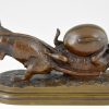 Antique bronze of two mice with egg