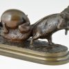 Antique bronze of two mice with egg