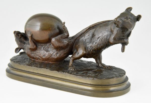 Antique bronze of two mice with egg