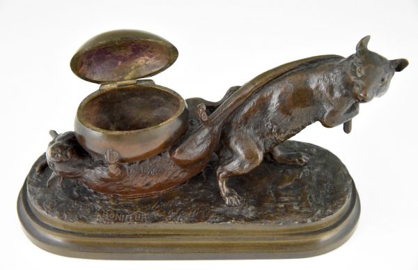 Antique bronze of two mice with egg