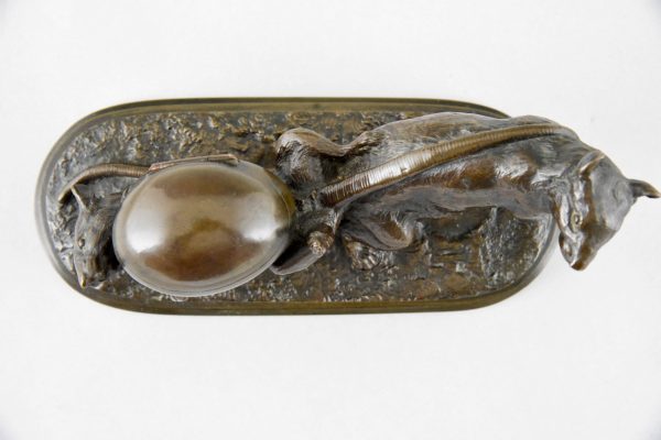 Antique bronze of two mice with egg