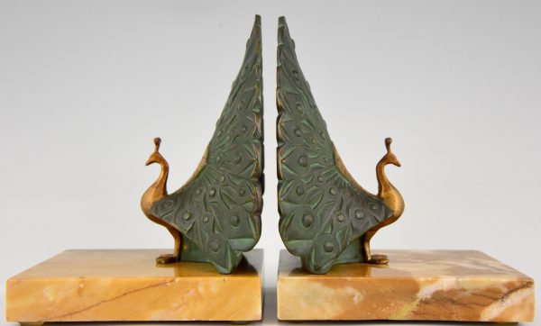 Art Deco serre livres bronze paon