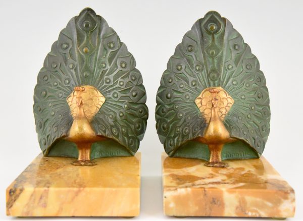 Art Deco serre livres bronze paon
