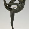 Art Deco bronze hoop dancer with feathered headdress