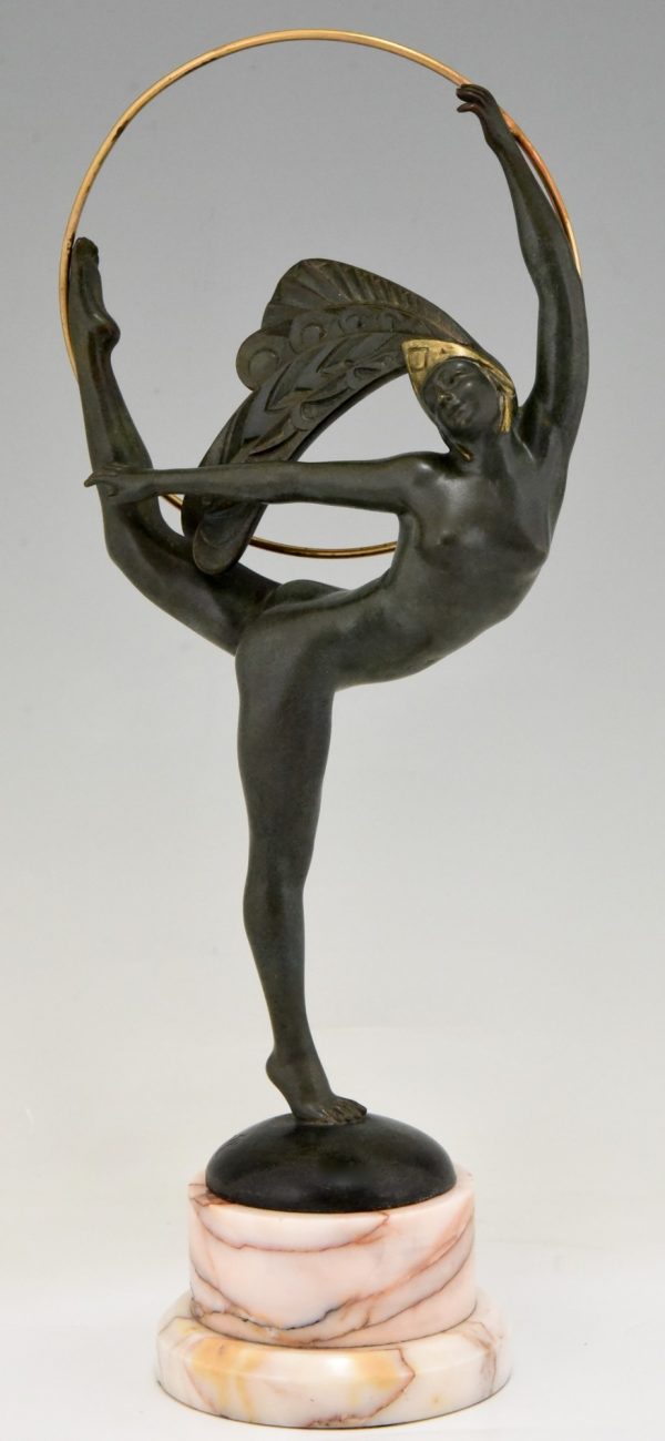 Art Deco bronze hoop dancer with feathered headdress