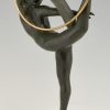 Art Deco bronze hoop dancer with feathered headdress