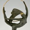 Art Deco bronze hoop dancer with feathered headdress