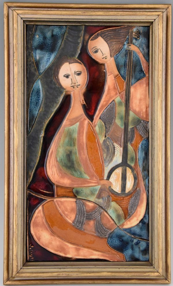 Glazed ceramic wall plaque with two women with instruments.