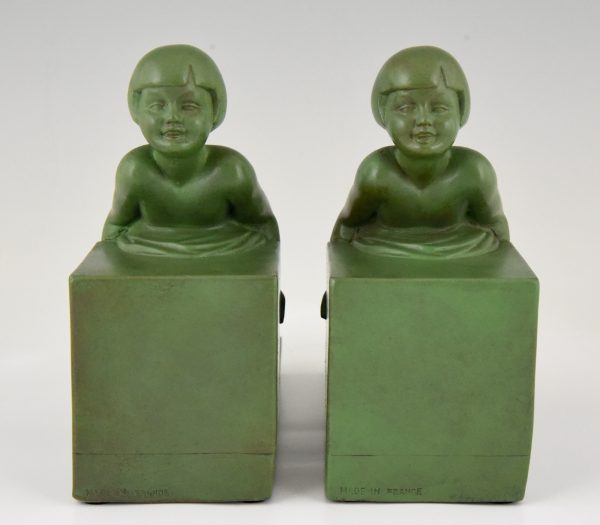 Art Deco bookends with children