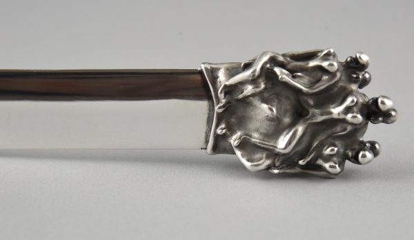 Silvered bronze erotic letter opener with nudes