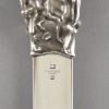 Silvered bronze erotic letter opener with nudes