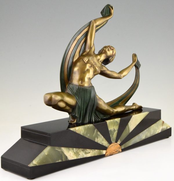 Art Deco bronze sculpture of a scarf dancer on sunburst base