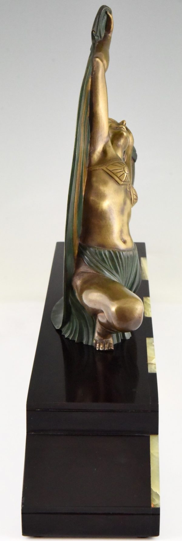 Art Deco bronze sculpture of a scarf dancer on sunburst base