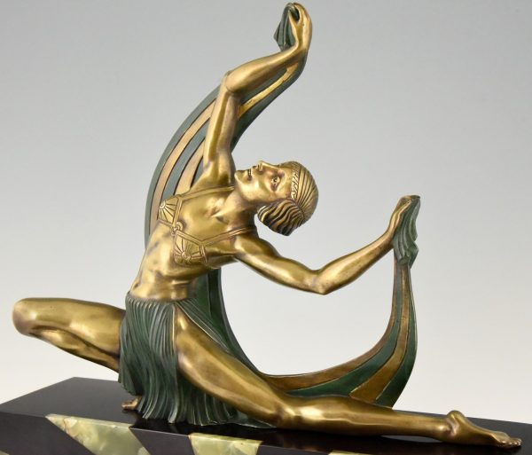 Art Deco bronze sculpture of a scarf dancer on sunburst base