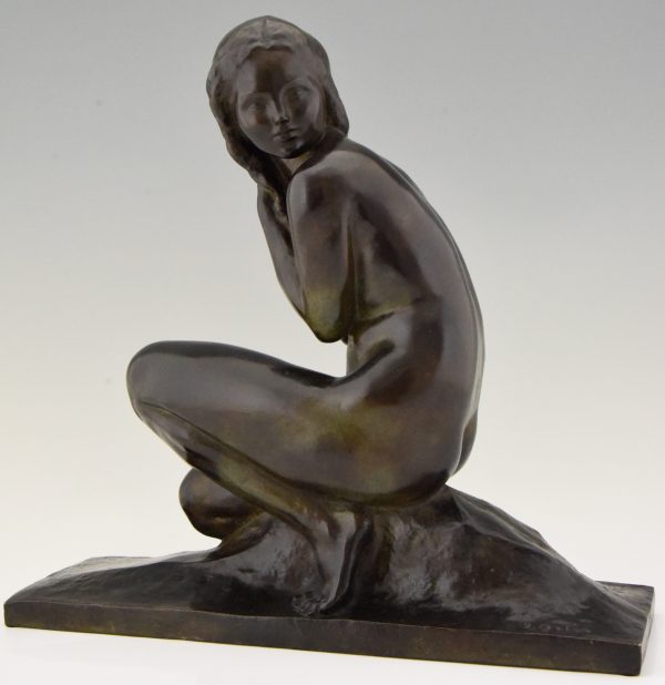 Art Deco bronze sculpture of a seated nude