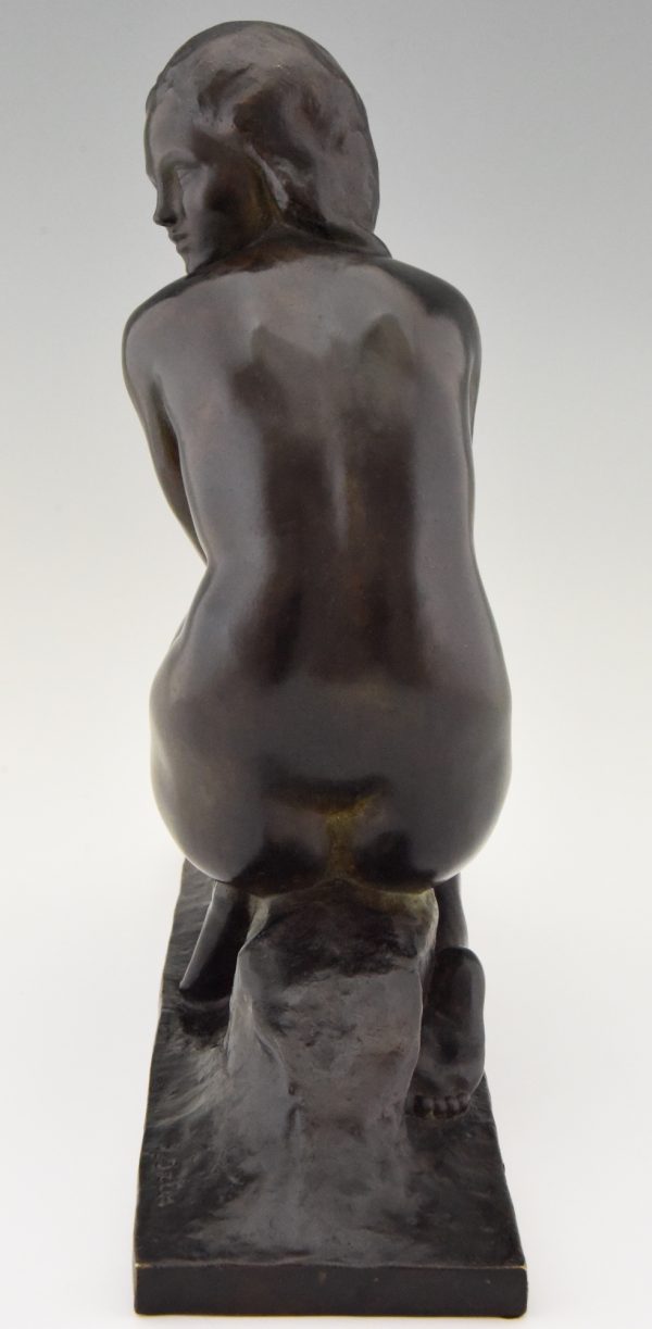 Art Deco bronze sculpture of a seated nude