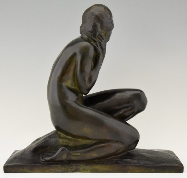 Art Deco bronze sculpture of a seated nude