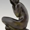 Art Deco bronze sculpture of a seated nude