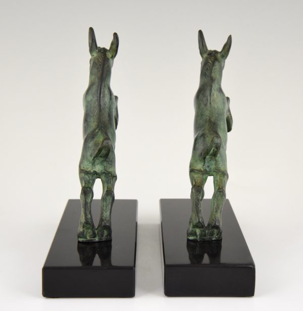 Art Deco bronze bookends with jumping goats.