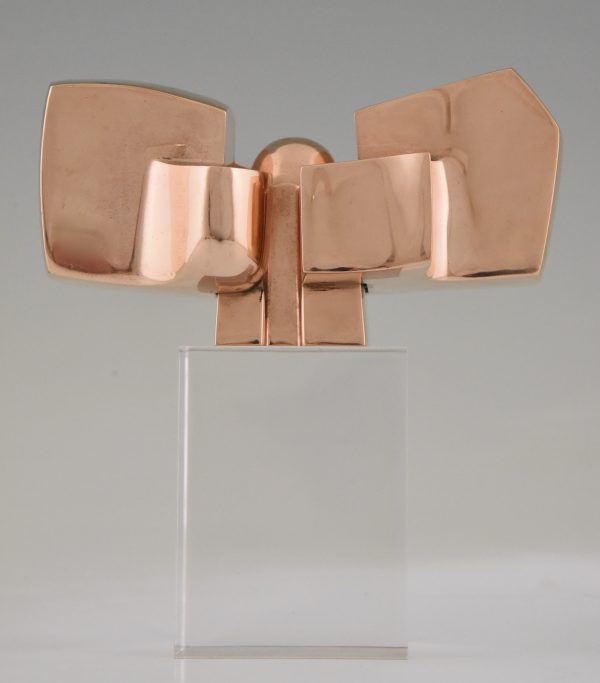 Bronze abstract sculpture on plexiglass base.