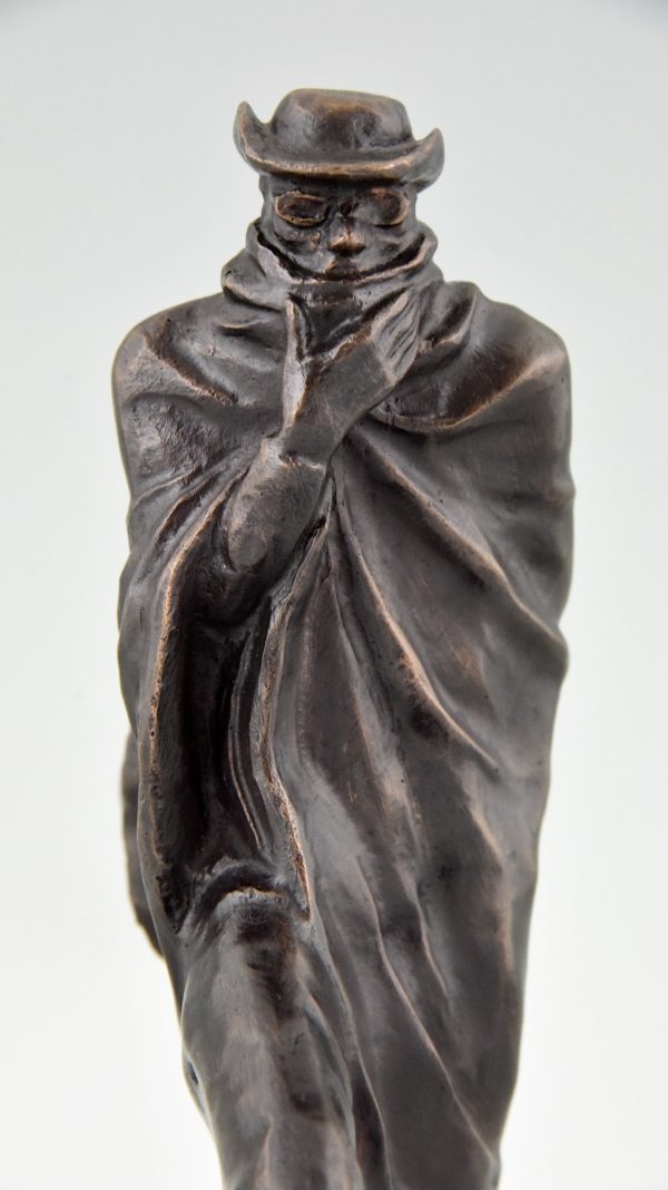 Pilgrim, bronze sculpture man with long coat and hat