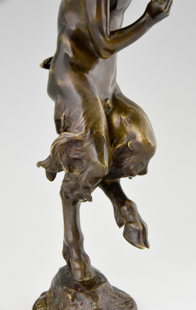 Antique bronze sculpture satyr with flute