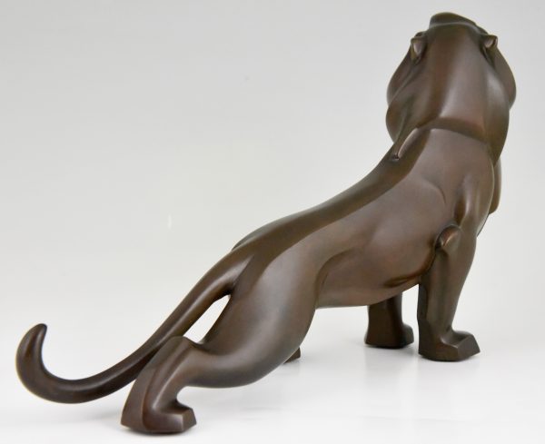 Art Deco bronze sculpture of a lion.